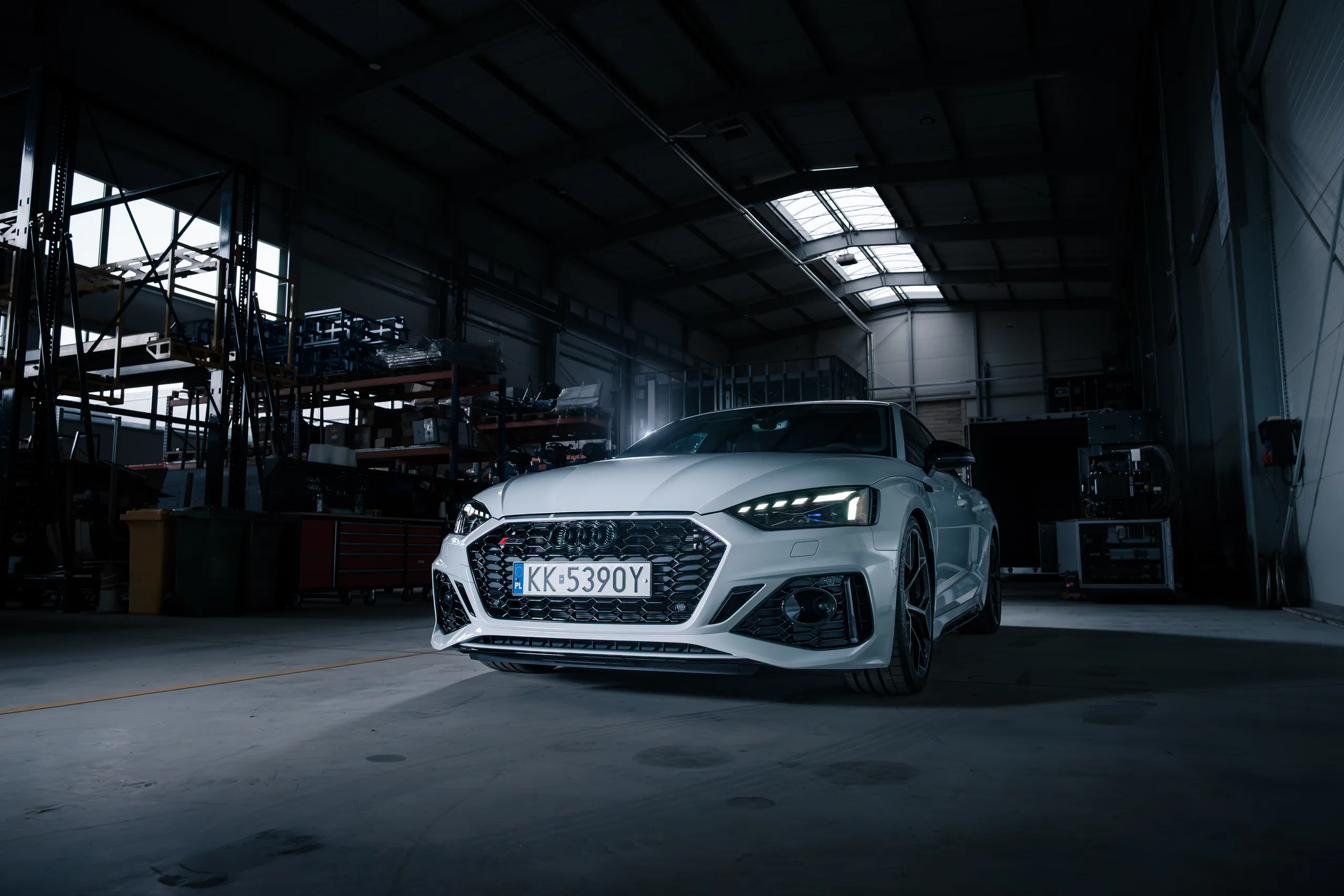 White Audi RS5 front, warehouse