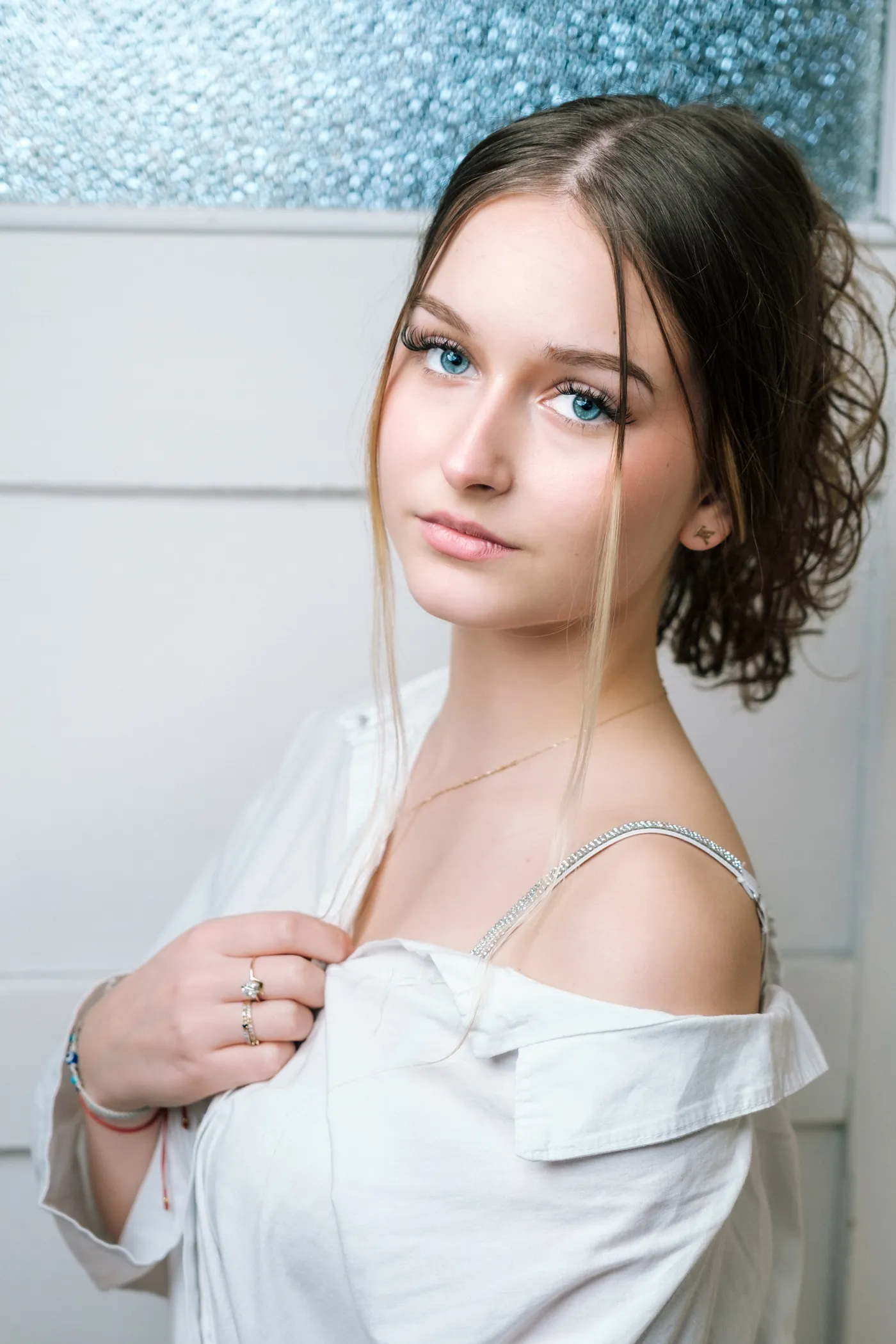 Portrait with off-shoulder white shirt