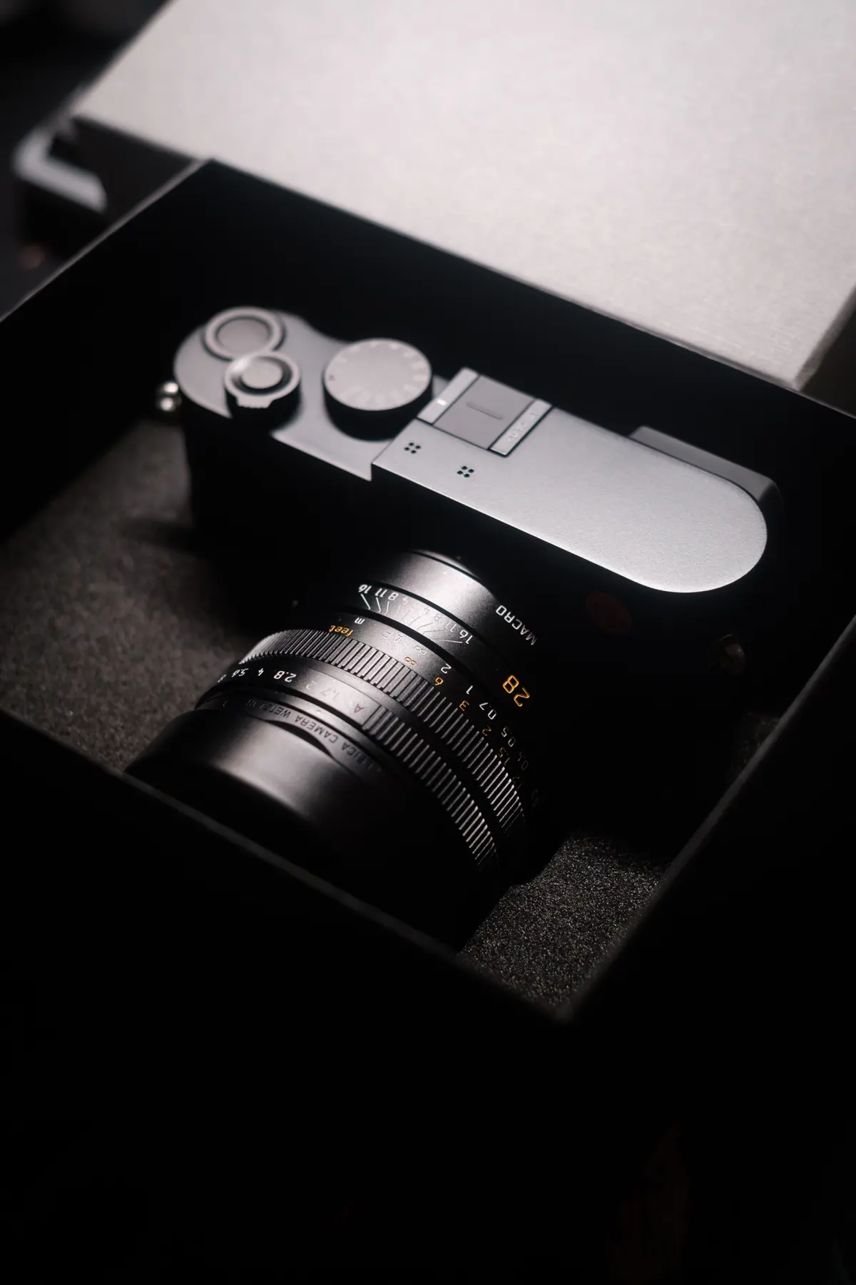 Leica camera resting in its box, overhead view